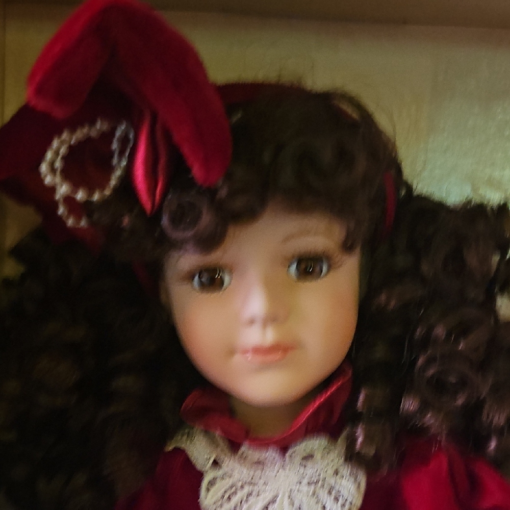 Charming Red and Brown Doll with Curly Hair
